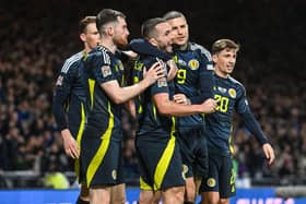 Scotland players celebrate John McGinn's winner against Croatia in a match broadast live free-to-air on YouTube. (Photo by Rob Casey / SNS Group)