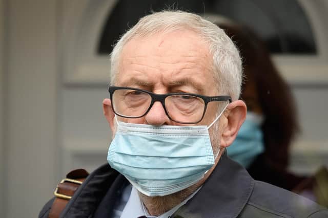 Former Labour Party leader Jeremy Corbyn demonstrates the 'nose out' face mask style, although he's not on public transport, in a shop or other confined space in this picture (Picture: Leon Neal/Getty Images)