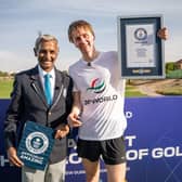 Luke Willett celebrates setting a new Guinness World Record for the fastest nine-hole round of golf by an individual. Picture: DP World