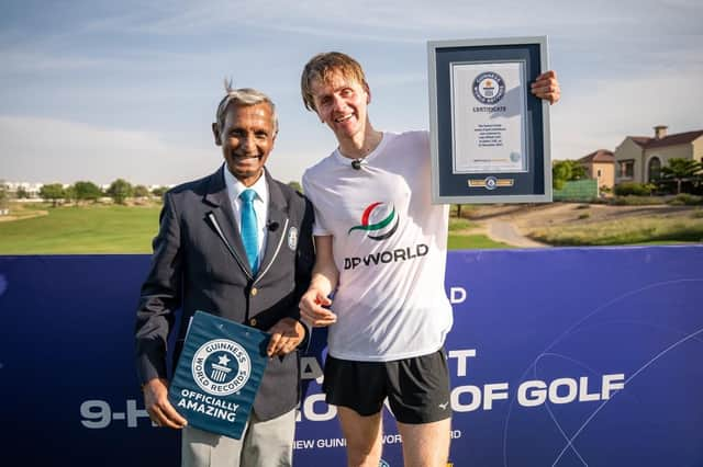 Luke Willett celebrates setting a new Guinness World Record for the fastest nine-hole round of golf by an individual. Picture: DP World