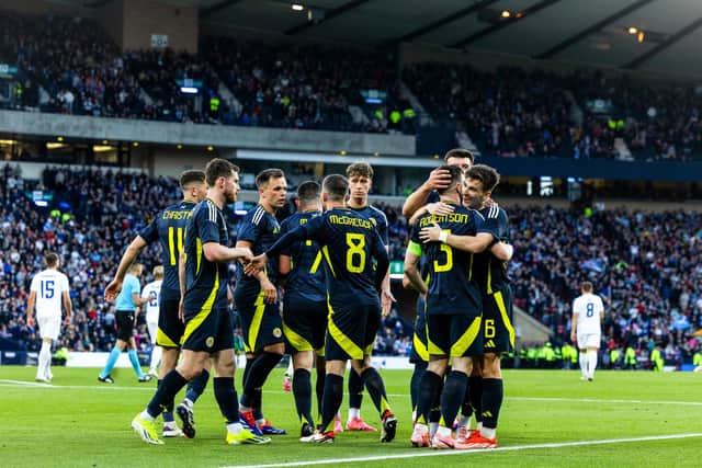 Scotland celebrate the opening goal against Finland at Hampden.