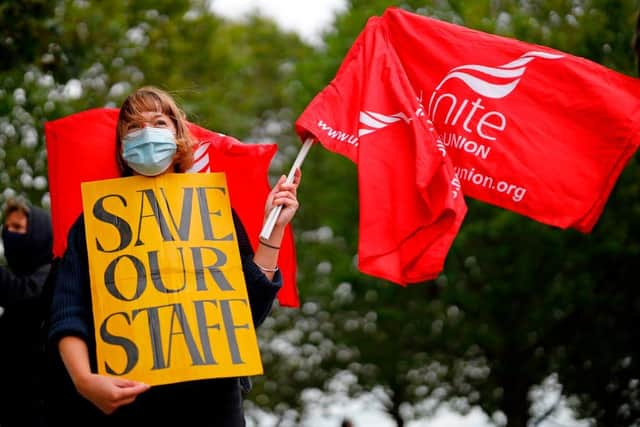 The Office for National Statistics (ONS) said the number of employees on payrolls dropped by 673,000 between March and September. (Photo by Tolga Akmen / AFP) (Photo by TOLGA AKMEN/AFP via Getty Images)