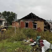 Russian-affiliated forces detained and tortured men in a cellar behind these houses that they occupied during March and April in Kapytolivka village, Kharkiv region. September 28, 2022.  Belkis Wille/Human Rights Watch