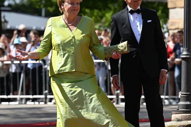 Former German chancellor Angela Merkel and husband Joachim Sauer at an arts festival in Germany this summer.