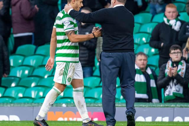 Celtic manager Ange Postecoglou commiserates with Giorgos Giakoumakis following a miserable afternoon for the Greek striker. (Photo by Rob Casey / SNS Group)