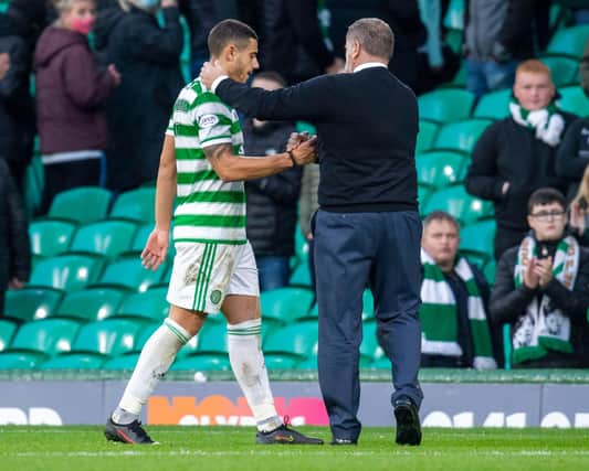 Celtic manager Ange Postecoglou commiserates with Giorgos Giakoumakis  following a miserable afternoon for the Greek striker. (Photo by Rob Casey / SNS Group)
