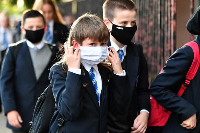 Pupils wear masks today at Holyrood Secondary School in Glasgow