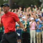 Tiger Woods celebrates on the 18th green after landing a fifth Masters win at Augusta National in 2019. Picture: Andrew Redington/Getty Images.