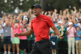 Tiger Woods celebrates on the 18th green after landing a fifth Masters win at Augusta National in 2019. Picture: Andrew Redington/Getty Images.