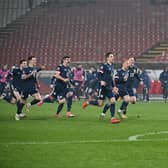 Scotland's players were jubilant after the win over Serbia.
