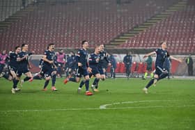 Scotland's players were jubilant after the win over Serbia.