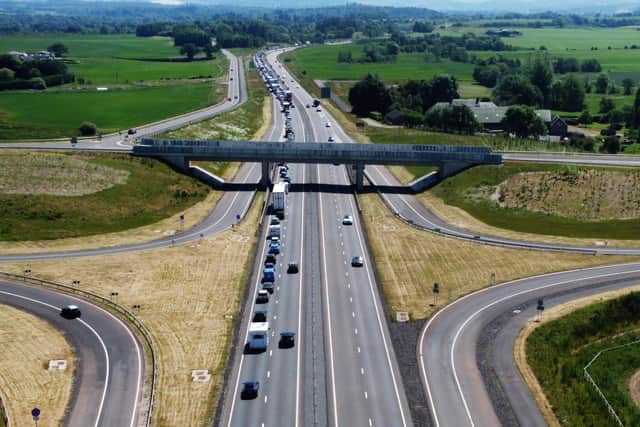 More than £900m of public money has been earmarked for high-carbon transport projects, including the Cross Tay Link and upgrades to the A9, under the City-Region Deals. Picture: John Devlin