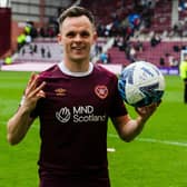 Hearts' Lawrence Shankland with the match ball after scoring a hat-trick against Ross County.