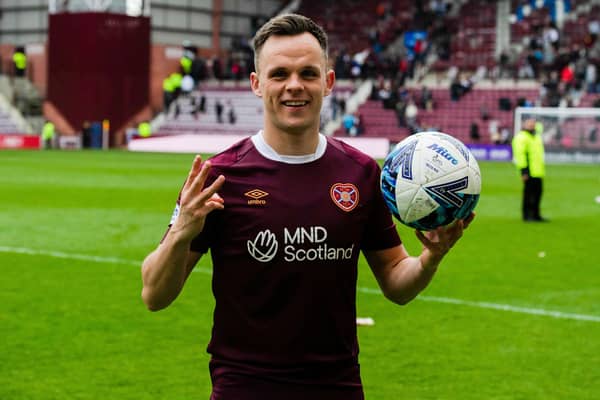 Hearts' Lawrence Shankland with the match ball after scoring a hat-trick against Ross County.