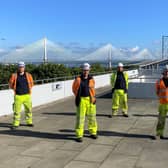 Openreach engineers are pictured at work on the Forth Road Bridge