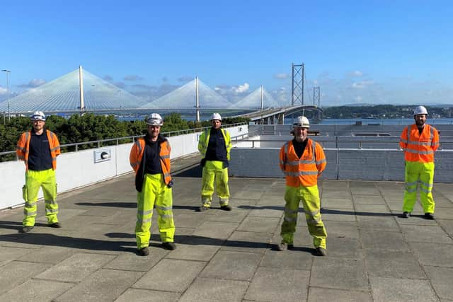 Openreach engineers are pictured at work on the Forth Road Bridge