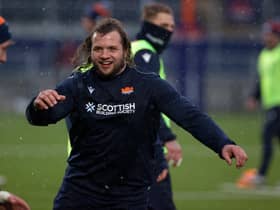 Pierre Schoeman enjoys a training session in the sleet with Edinburgh.  (Photo by Craig Williamson / SNS Group)