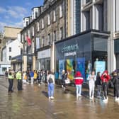 People queue outside the flagship Primark store on Princes Street in Edinburgh after it reopened following the initial spring 2020 lockdown. Picture: Jane Barlow/PA Wire