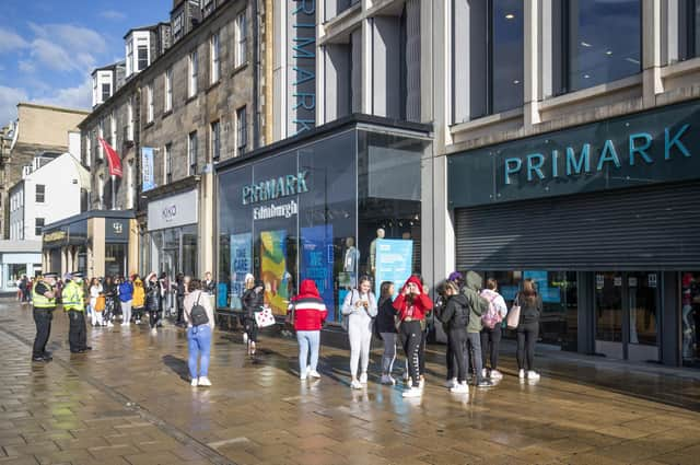 People queue outside the flagship Primark store on Princes Street in Edinburgh after it reopened following the initial spring 2020 lockdown. Picture: Jane Barlow/PA Wire