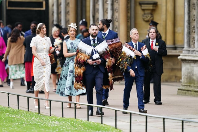 Guests arriving ahead of the coronation ceremony of King Charles III and Queen Camilla at Westminster Abbey, London.