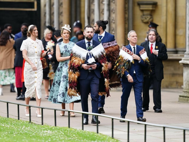 Guests arriving ahead of the coronation ceremony of King Charles III and Queen Camilla at Westminster Abbey, London.