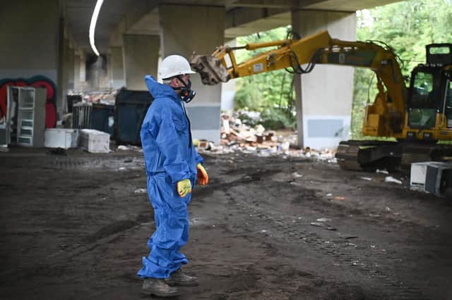 The eyesore, suspected to contain asbestos and other potentially dangerous material, was branded a disgrace by residents, politicians and anti-littering groups. Picture: John Devlin