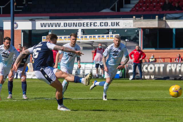Dundee striker Jason Cummings - seen here slotting home from the spot in the 2-1 win over Raith Rovers on Saturday - is happy to be back on penalties (Photo by Mark Scates / SNS Group)