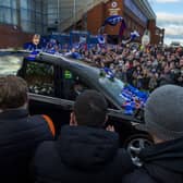 Fans gathered as the funeral car passed by Ibrox.