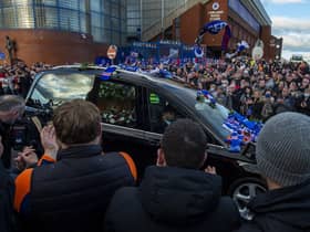 Fans gathered as the funeral car passed by Ibrox.