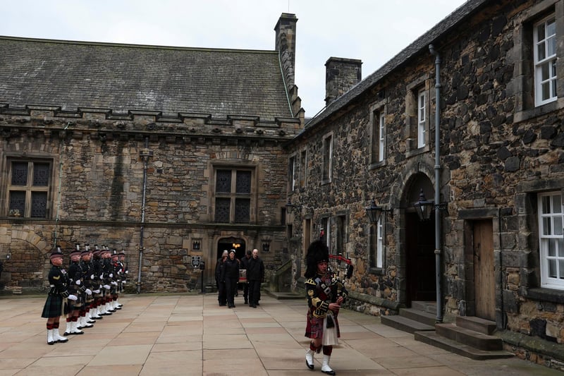 A Piper leads the procession of the Stone of Destiny, which is also known as the Stone of Scone, in Edinburgh Castle before its onward transportation to be placed beneath the Coronation Chair at Westminster Abbey for the coronation of King Charles III.