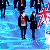 Great Britain's flag bearers Dave Ryding and Eve Muirhead lead the team out during the opening ceremony of the Beijing 2022 Winter Olympic Games at the Beijing National Stadium in China. Picture date: Friday February 4, 2022.