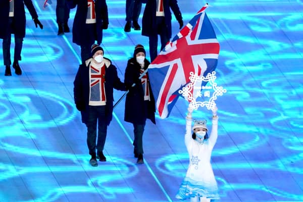 Great Britain's flag bearers Dave Ryding and Eve Muirhead lead the team out during the opening ceremony of the Beijing 2022 Winter Olympic Games at the Beijing National Stadium in China. Picture date: Friday February 4, 2022.