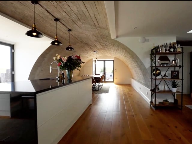 Euan did much of the work himself, converting the former concrete water tank into a distinctive family home.