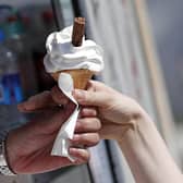 A sunny day provides a good excuse for an ice cream (Picture: Adrian Dennis/AFP via Getty Images)