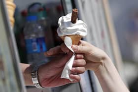 A sunny day provides a good excuse for an ice cream (Picture: Adrian Dennis/AFP via Getty Images)