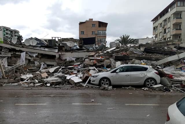 Family members have sent Tekin Esmer pictures of the devastation on the street in the Turkish city of Iskenderun where he grew up.
