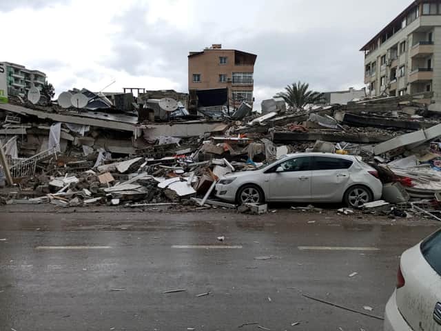 Family members have sent Tekin Esmer pictures of the devastation on the street in the Turkish city of Iskenderun where he grew up.