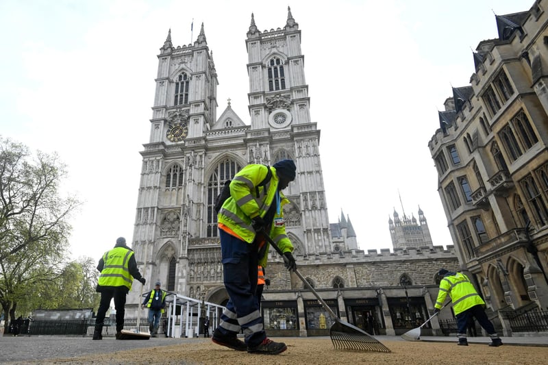 Final preparations are made in front of Westminster Abbey, London,  ahead of the coronation of King Charles III and Queen Camilla on Saturday.  Picture, Toby Melville/PA Wire