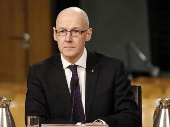 John Swinney is being urged to clarify the situation over exams