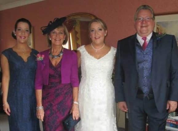 Mike Sanders, far right, pictured on daughter Katie Morton’s wedding day, with bride Katie, her twin sister Emma, far left, and wife Pat