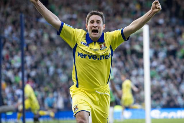 Johnson celebrates after Kilmarnock took the lead against Celtic at Hampden in 2012.