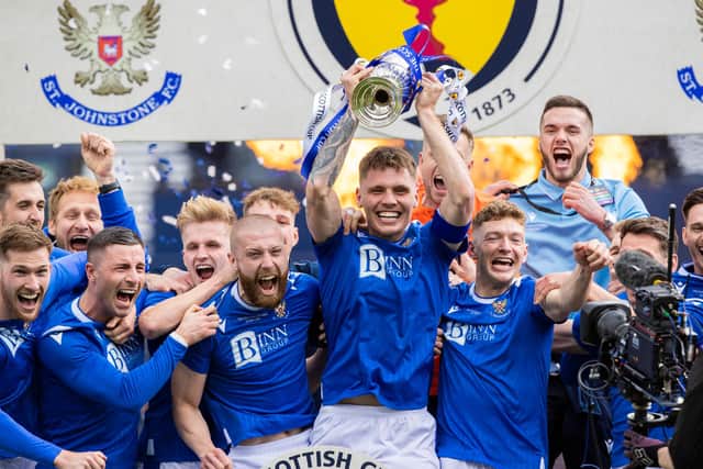 St Johnstone captain Jason Kerr lifts the Scottish Cup.