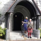 King Charles III and Queen Camilla depart Crathie Parish Church following a church service to mark the first anniversary of the death of Queen Elizabeth II (Photo by Andrew Milligan - Pool/Getty Images)