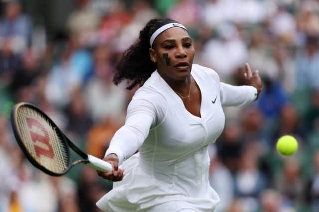 Serena Williams thumps away a volley against Harmony Tan