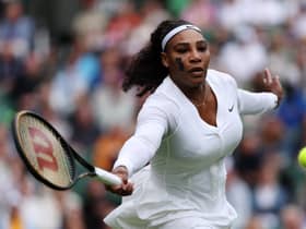 Serena Williams thumps away a volley against Harmony Tan
