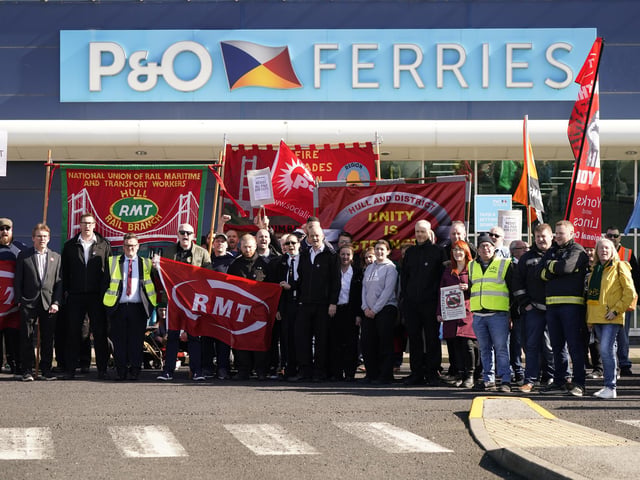 Protesters stand outside the P&O building at the Port of Hull,
