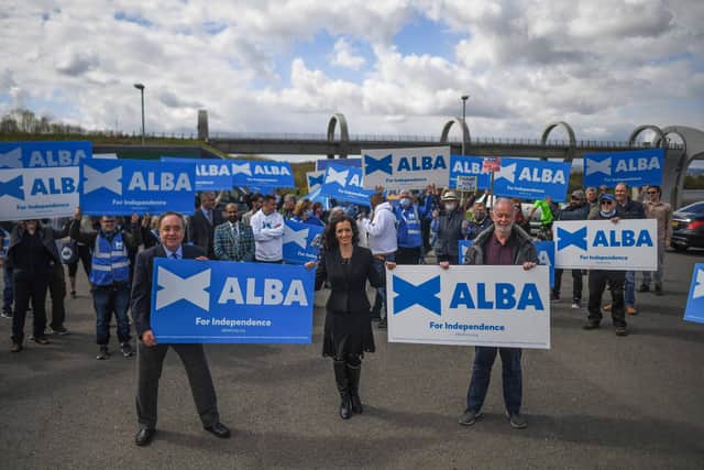 Alex Salmond, leader of the Alba Party, and Tasmina Ahmed-Sheikh are seen during a campaign event at The Falkirk Wheel on April 30, 2021 in Falkirk