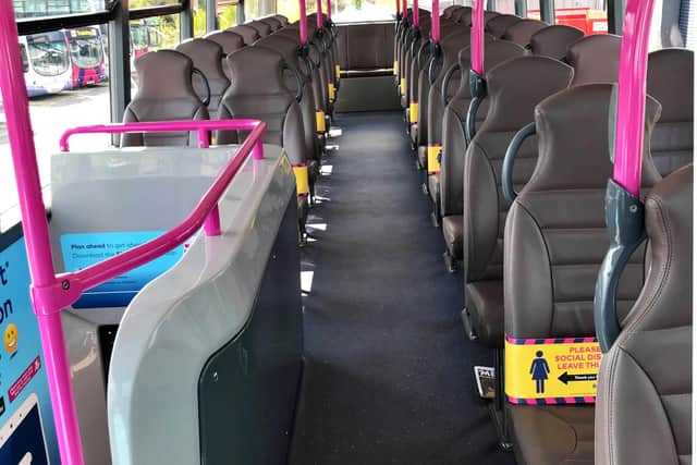 Seats could be marked to be left free diagonally along the bus.