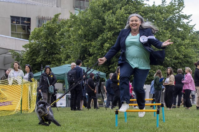 Roz McCall, Scottish Conservative MSP for Mid Scotland and Fife, with Suzie as they take on the assault course at the fifth Holyrood Dog of the Year competition. Picture:  Katielee Arrowsmith/SWNS