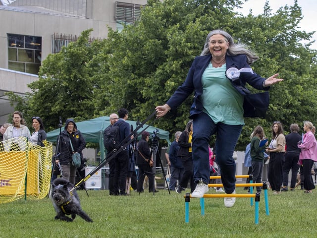 Roz McCall, Scottish Conservative MSP for Mid Scotland and Fife, with Suzie as they take on the assault course at the fifth Holyrood Dog of the Year competition. Picture: Katielee Arrowsmith/SWNS